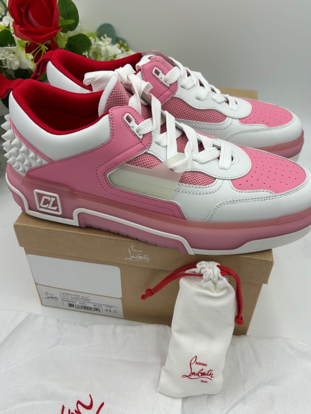 Men’s Christian Louboutin ASTROLOUBI pink/white colorway sneakers.Size 44.5/11.5